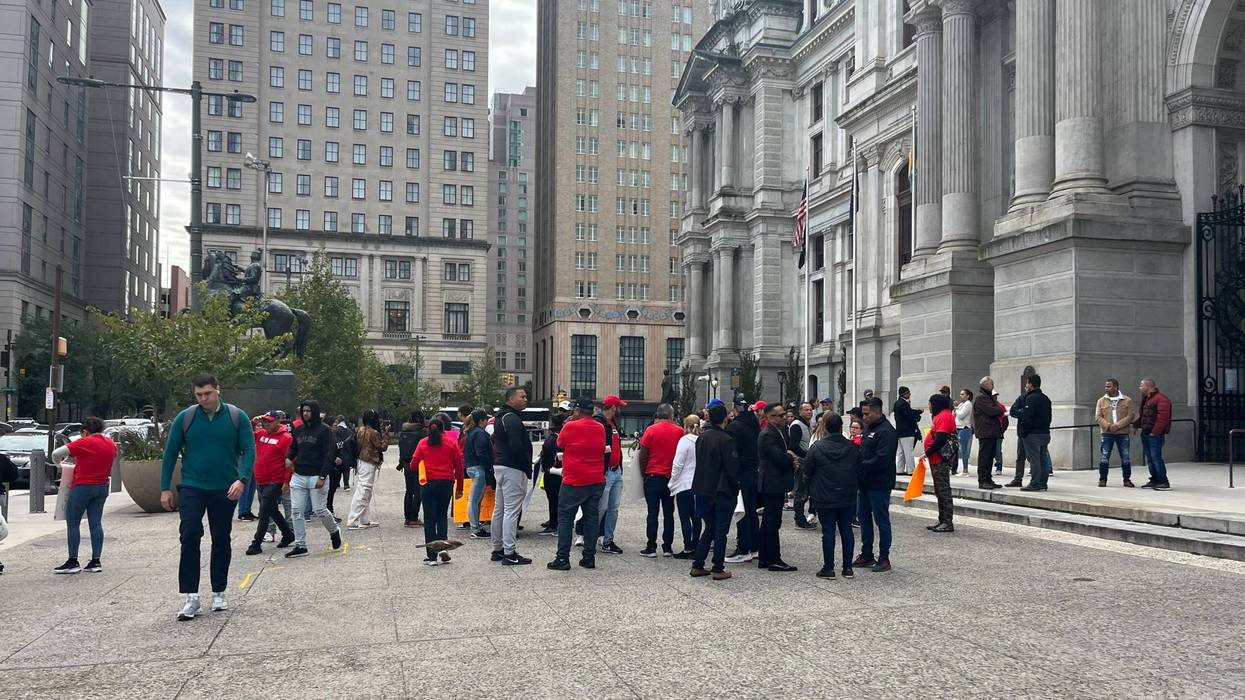 Members of the Dominican Grocers Association said they rallied at City Hall on Wednesday because they don’t feel safe in their bodegas.