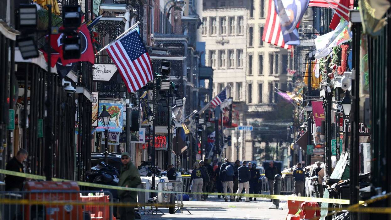 Members of the FBI and New Orleans Police work the scene on Bourbon Street after at least 10 people were killed when a person allegedly drove into a crowd in the early morning hours of New Year's Day on Jan. 1, 2025, in New Orleans, Louisiana.