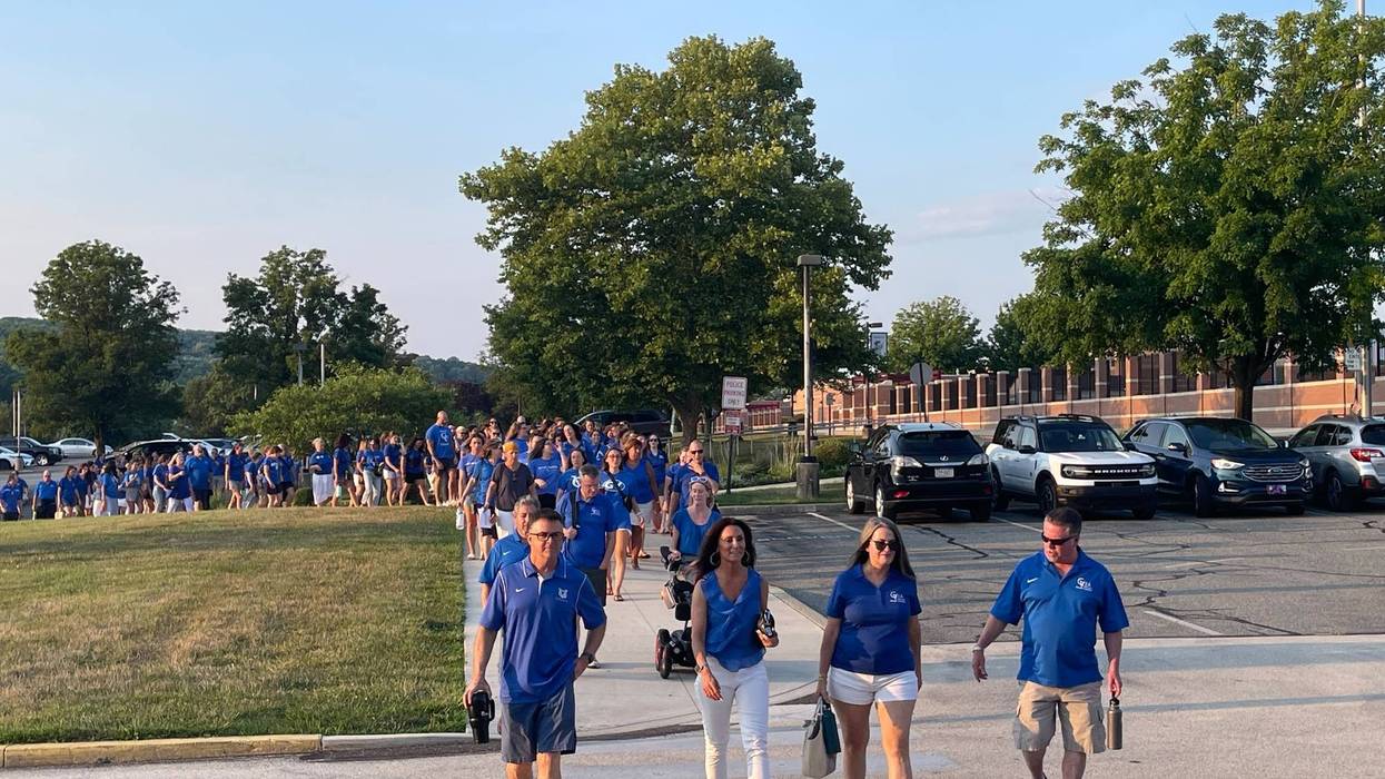 Members of the Great Valley school community walk into a school board meeting on July 15, 2024, in Malvern to demand more oversight after it came to light that middle school students impersonated nearly two dozen of their teachers on TikTok.