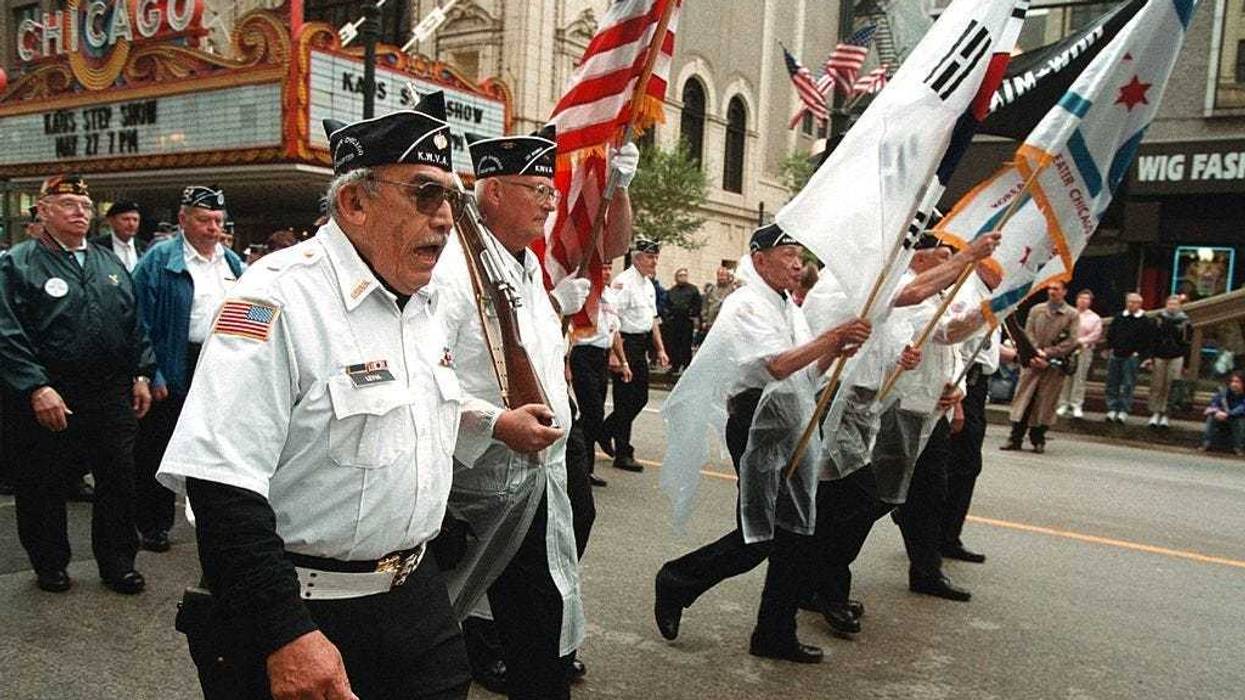 Members of the Greater Chicago Chapter of the Korean War Veterans march during the Memorial Day Parade May 27, 2000 in Chicago.