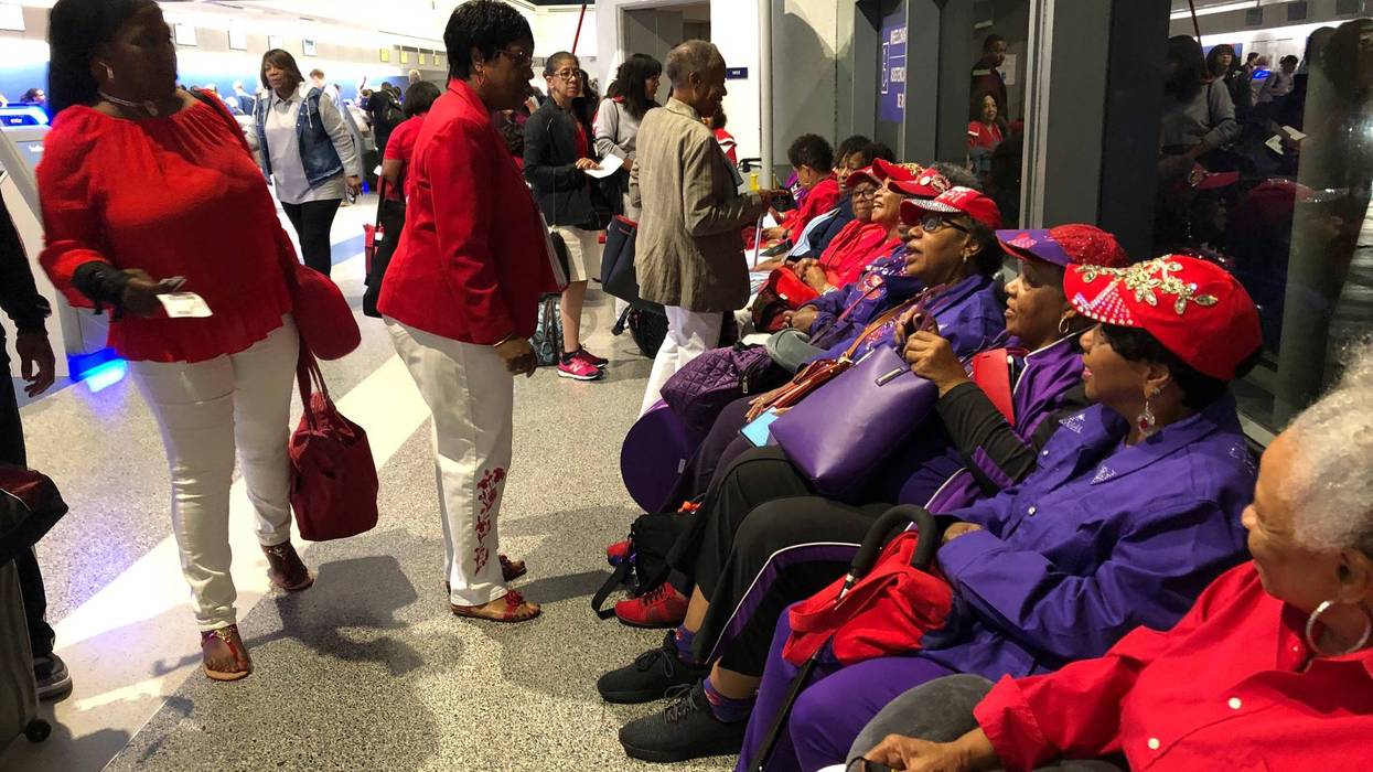Members of the Ladies in Red group meet at Oakland International Airport on Aug. 8, 2019 to begin a civil rights tour in the South.