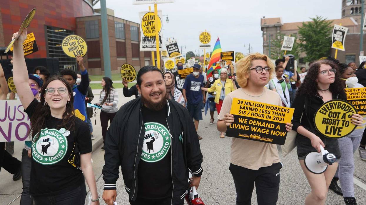Members of the Memphis 7, a group of Starbucks employees that were fired after seeking to form a union at their store, march through the streets of Downtown Memphis on Monday, May 23, 2022.