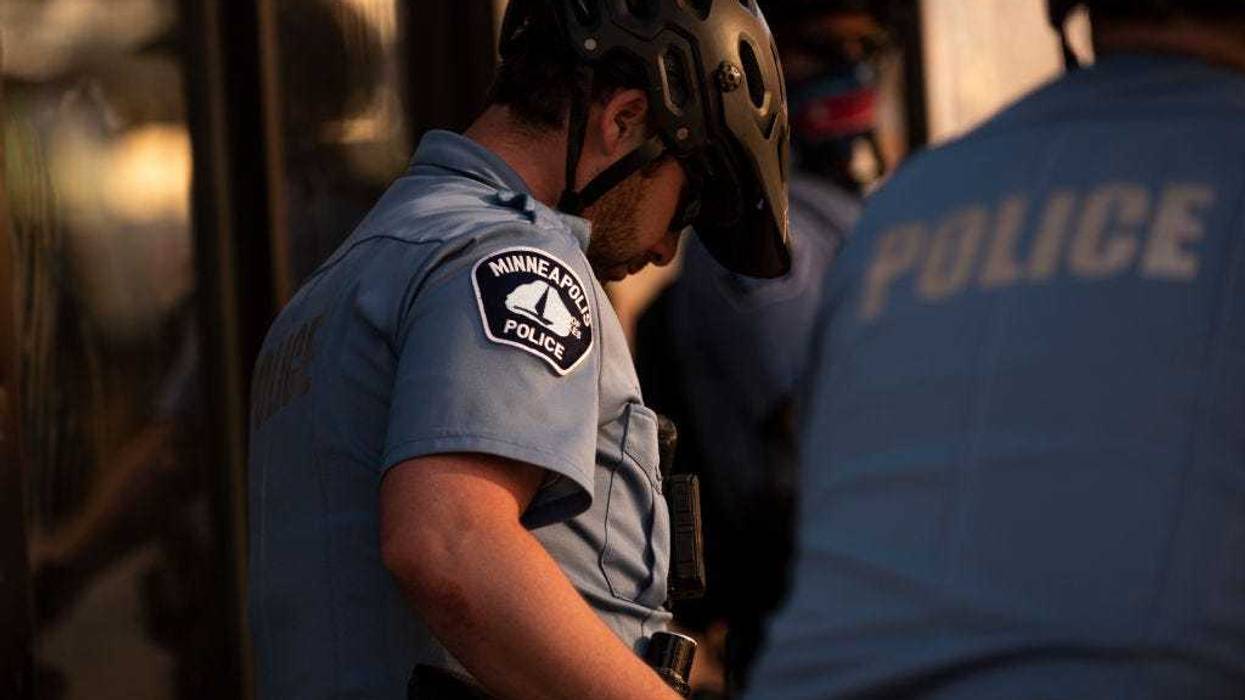 Members of the Minneapolis Police Department monitor a protest on June 11, 2020 in Minneapolis, Minnesota. The MPD has been under scrutiny from residents and local city officials after the death of George Floyd in police custody on May 25.