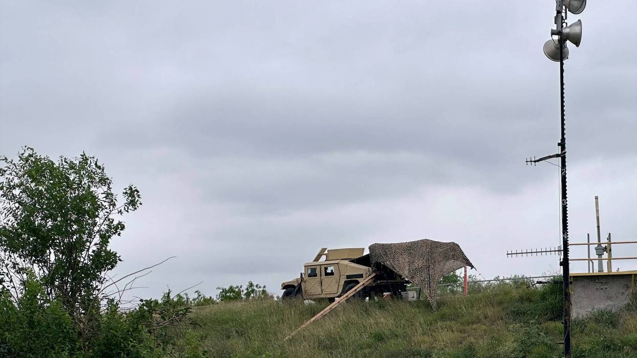 Members of the National Guard patrol a road near a federal border wall on Tuesday, March 19, 2024, in Hidalgo, Texas.