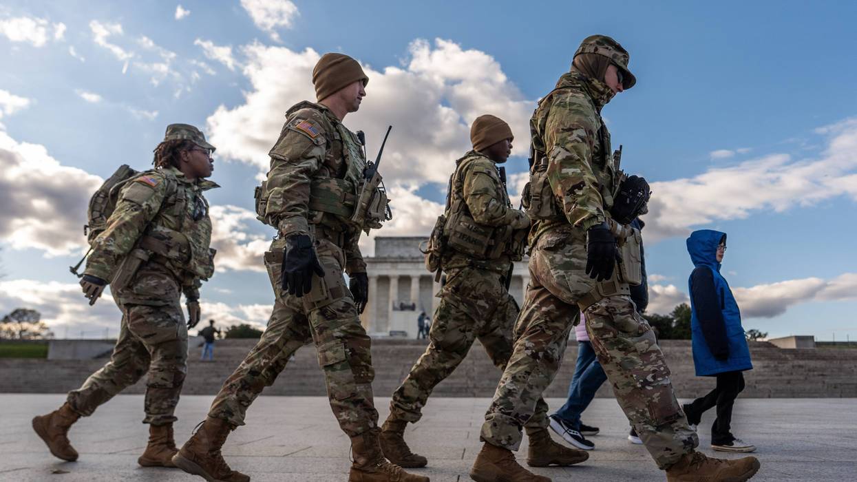 Members of the National Guard patrol in front of the Lincoln Memorial on the National Mall, Friday, Nov. 28, 2025, in Washington.