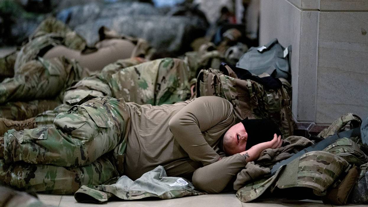 Members of the National Guard sleep in the U.S. Capitol on January 14, 2021 in Washington, DC. Security has been increased throughout Washington following the breach of the U.S. Capitol last Wednesday, and leading up to the Presidential Inauguration.