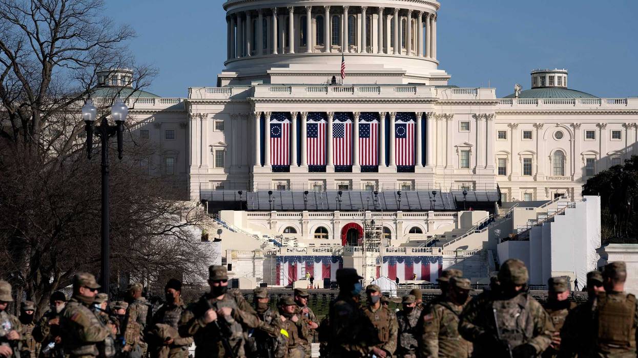 Members of the National Guard stand outside the U.S. Capitol on January 14, 2021 in Washington, DC. Security has been increased throughout Washington following the breach of the U.S. Capitol last Wednesday, and leading up to the Presidential Inauguration.