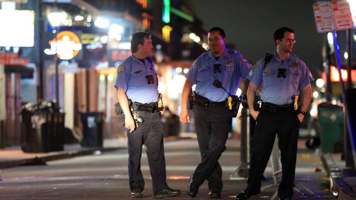 Members of the New Orleans Police Department stand on Bourbon Street as Louisiana Governor John Bel Edwards orders bars, gyms and casinos to close until April 13th due to the spread of coronavirus (COVID-19) on March 16, 2020 in New Orleans, Louisiana. The World Health Organization declared COVID-19 a global pandemic on March 11. (Photo by Chris Graythen/Getty Images)