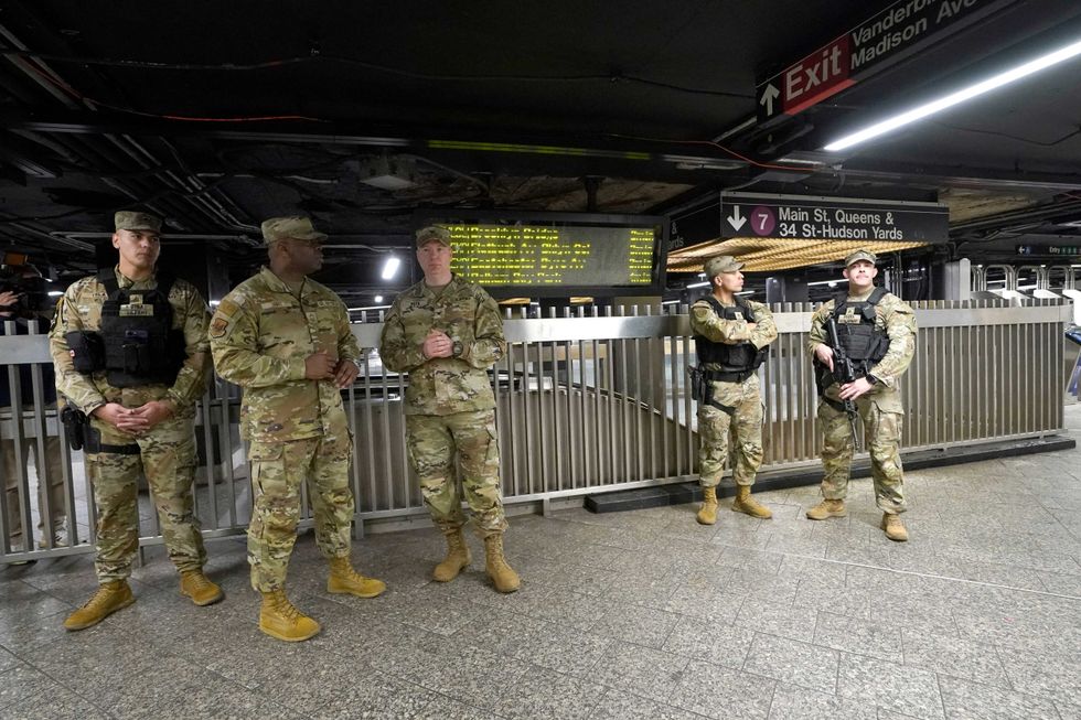 Members of the New York National patrol the subway at Grand Central Terminal on March 7, 2024