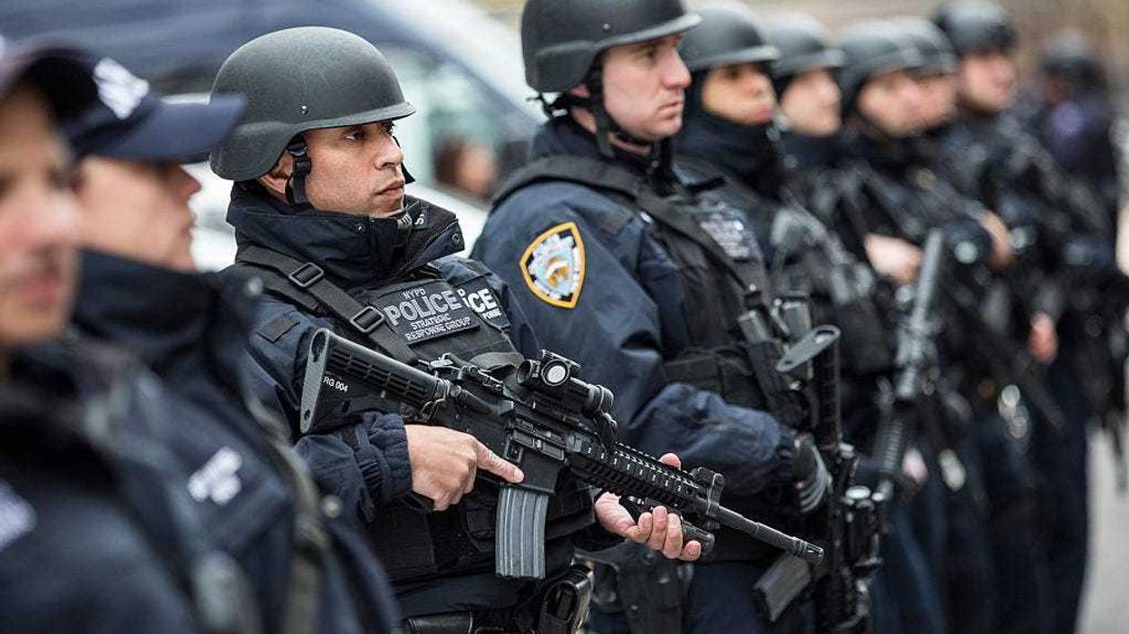 Members of the New York Police Department (NYPD) Strategic Response Group, which is funded in part through the Urban Area Security Initiative grant, stand outside NYPD headquarters after a press conference on Feb. 17, 2016, in New York City.