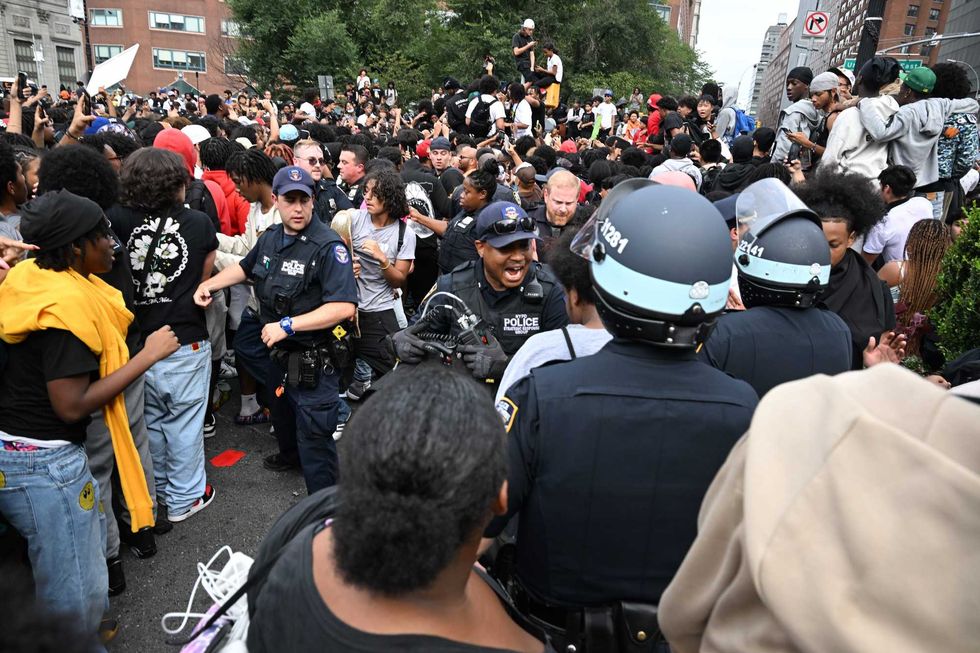 Members of the NYPD respond to the disruptions caused by large crowds in Union Square on Aug. 4, 2023