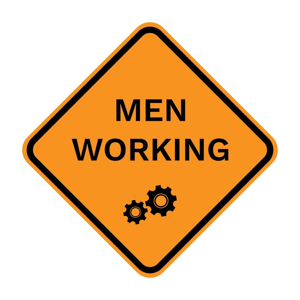 MEN WORKING sign