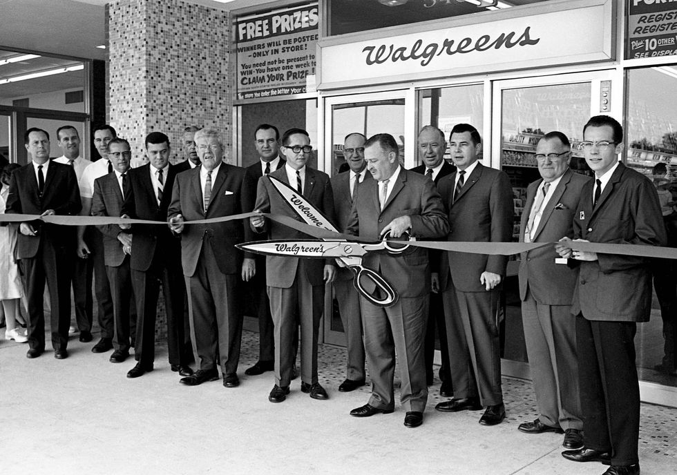 Metro Mayor Beverly Briley, holding the scissors, gets ready to cuts the ribbon to formally opening Nashville