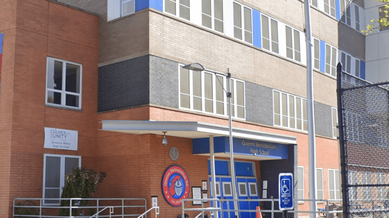 Metropolitan High School, where a crossing guard was filmed shoving a student.