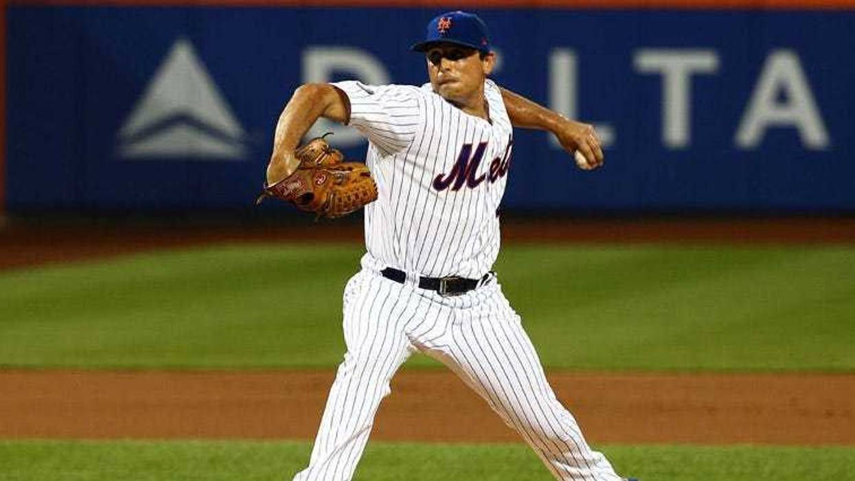Mets left fielder Dominic Smith (22) fails to field a ball during the first inning against the Los Angeles Dodgers on June 24, 2018, at Citi Field.