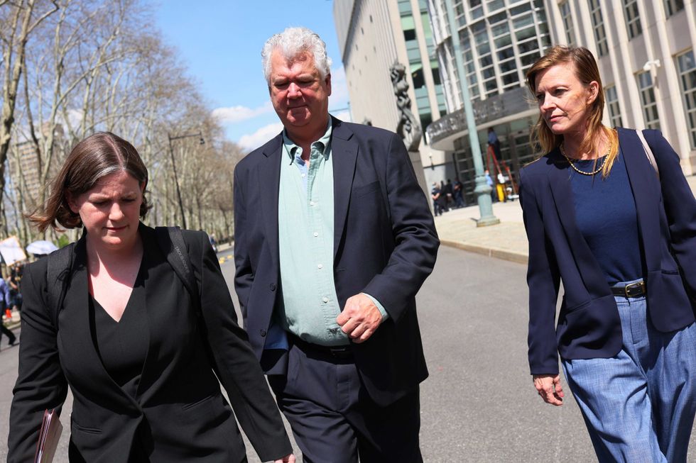 Mia Eisner-Grynberg and Deirdre von Dornum, both of Federal Defenders of New York and lawyers for mass shooting suspect Frank James, leave after speaking with members of the media following a brief proceeding in Brooklyn federal court on April 14, 2022