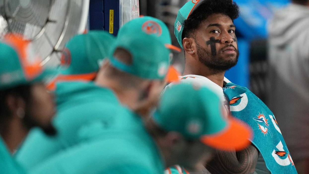 Miami Dolphins quarterback Tua Tagovailoa (1) sits on the bench during the second half against the Buffalo Bills at Hard Rock Stadium.