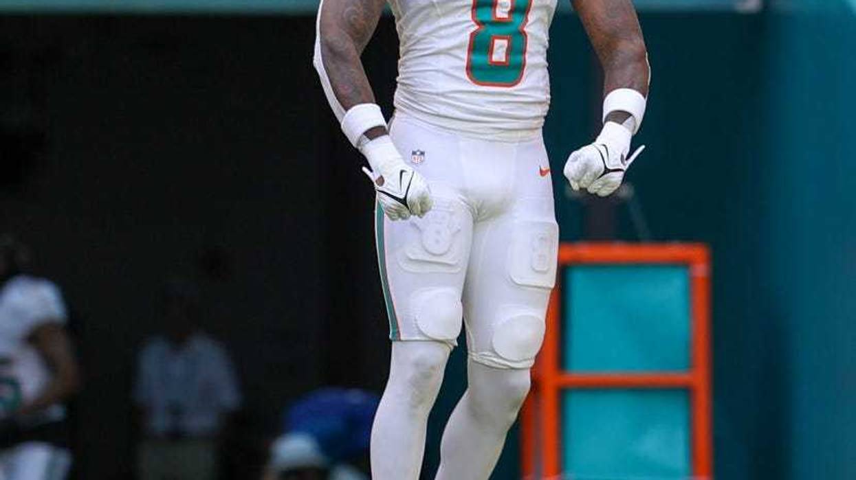 Miami Dolphins safety Jevon Holland (8) is introduced onto the field before a game against the Denver Broncos at Hard Rock Stadium.
