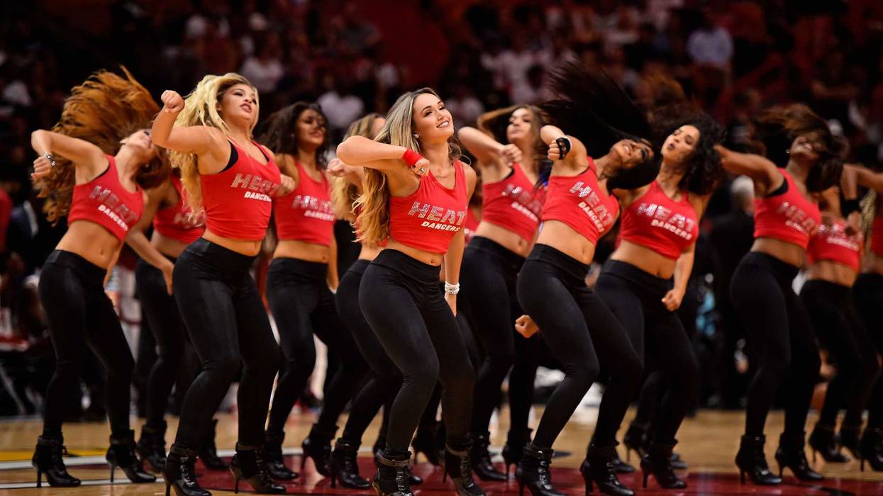 Miami Heat dancers perform during the first half between the Miami Heat and the San Antonio Spurs at American Airlines Arena.