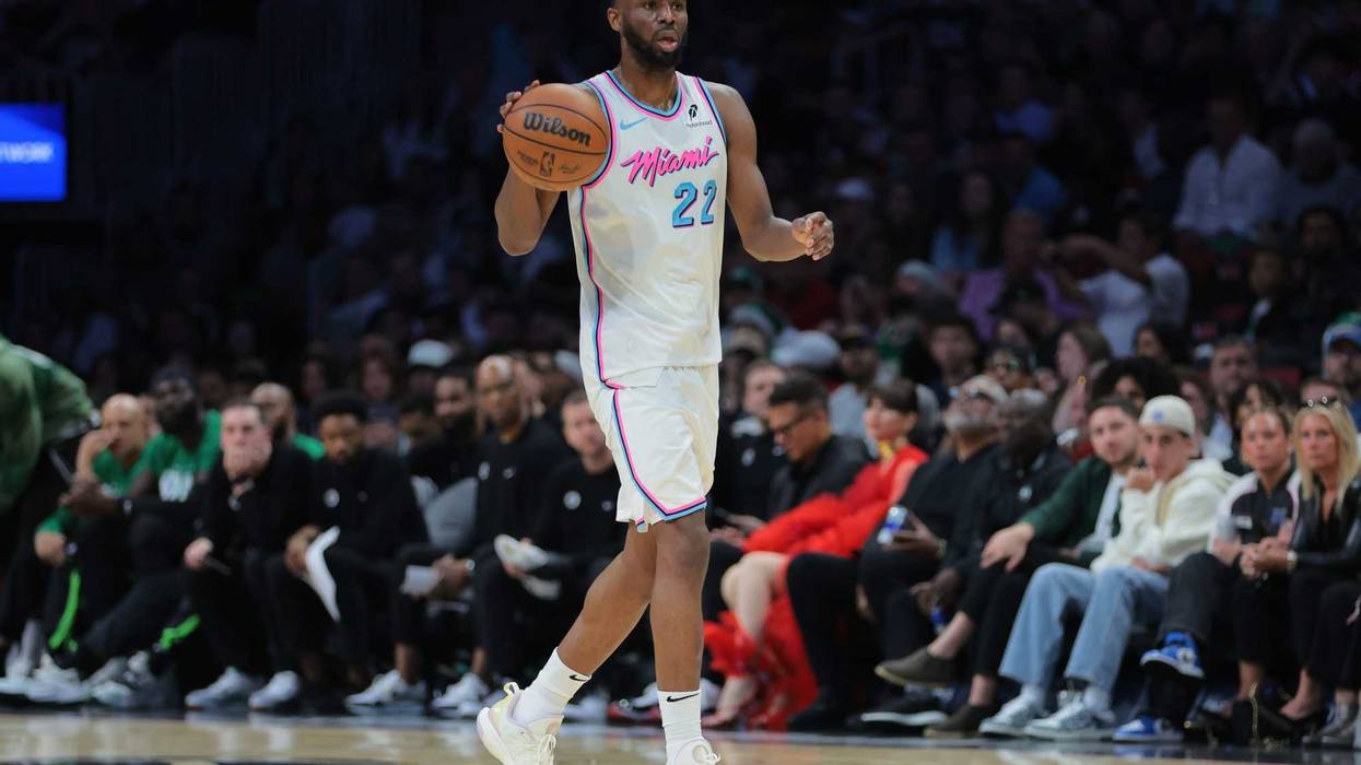 Miami Heat forward Andrew Wiggins dribbles against the Celtics at Kaseya Center
