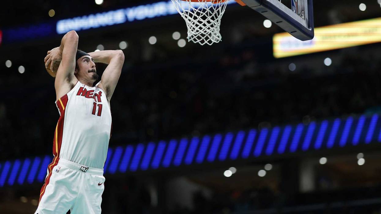 Miami Heat guard Jaime Jaquez Jr. (11) dunks the ball against the Washington Wizards in the first half at Capital One Arena. Mandatory Credit: Geoff Burke-USA TODAY Sports