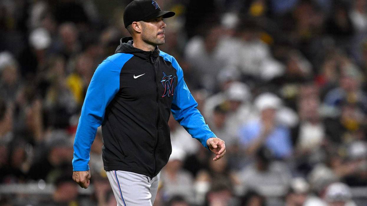 Miami Marlins manager Skip Schumaker walks to the mound during the fourth inning against the San Diego Padres at Petco Park