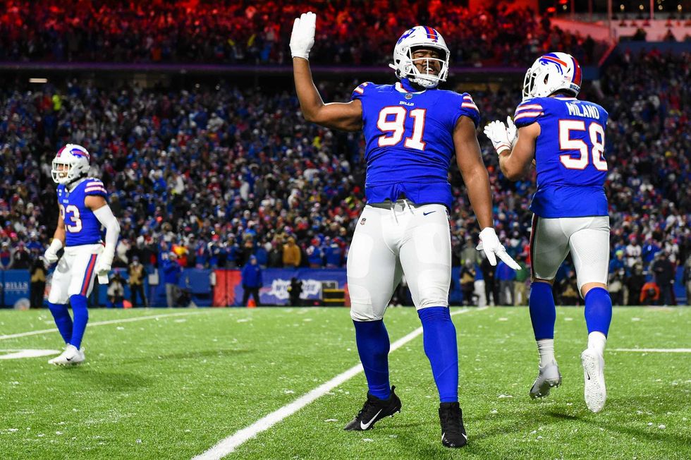 Micah Hyde, Ed Oliver and Matt Milano