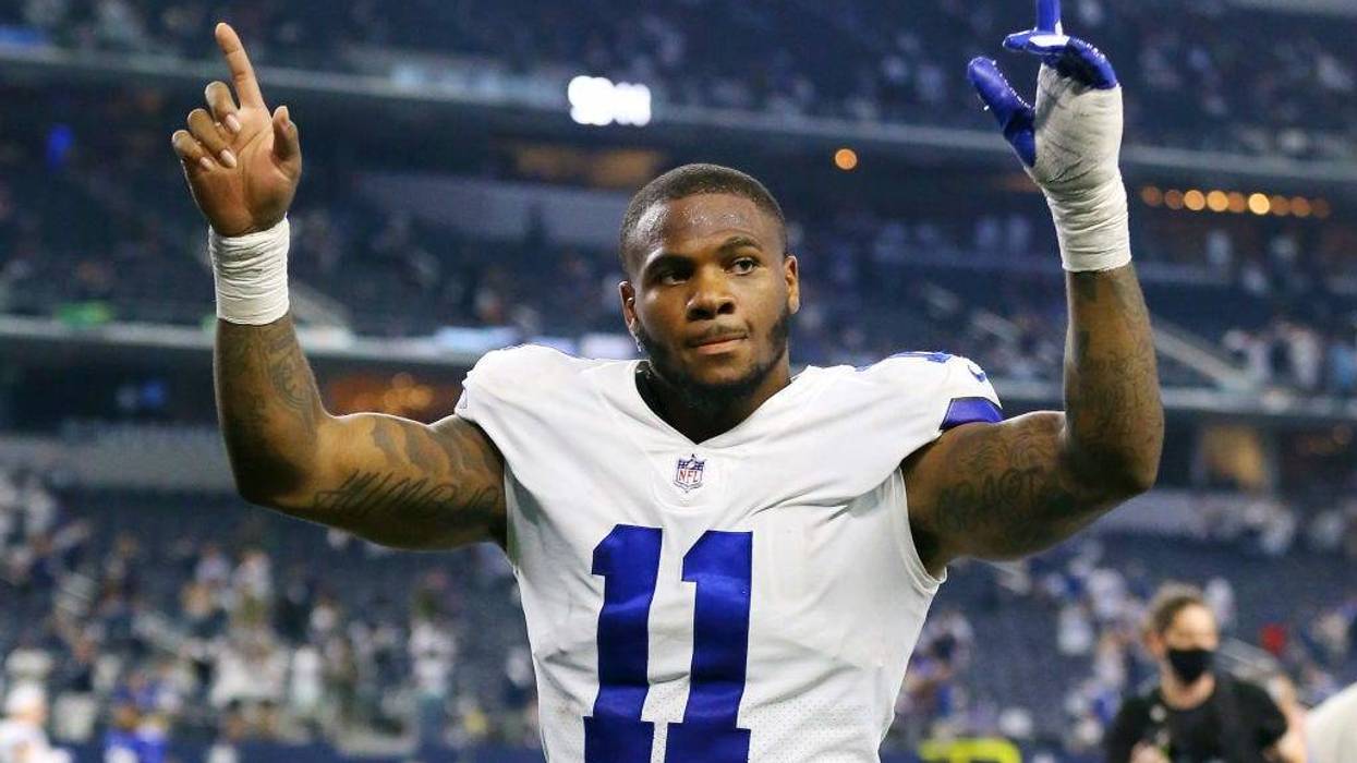Micah Parsons #11 of the Dallas Cowboys celebrates after defeating the New York Giants at AT&T Stadium on October 10, 2021 in Arlington, Texas.