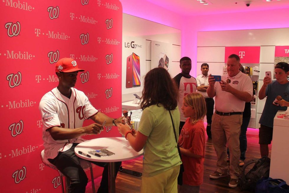 Michael A. Taylor, of the Washington Nationals, joins 106.7 The Fan's Grant Paulsen to meet and greet fans at T-Mobile in Pentagon City.