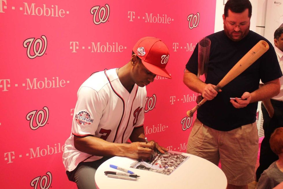 Michael A. Taylor, of the Washington Nationals, joins 106.7 The Fan's Grant Paulsen to meet and greet fans at T-Mobile in Pentagon City.