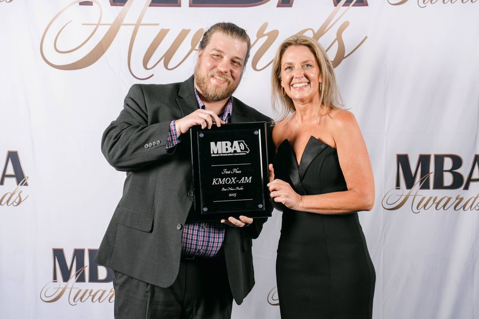 Michael Calhoun with the award for Best News Anchor