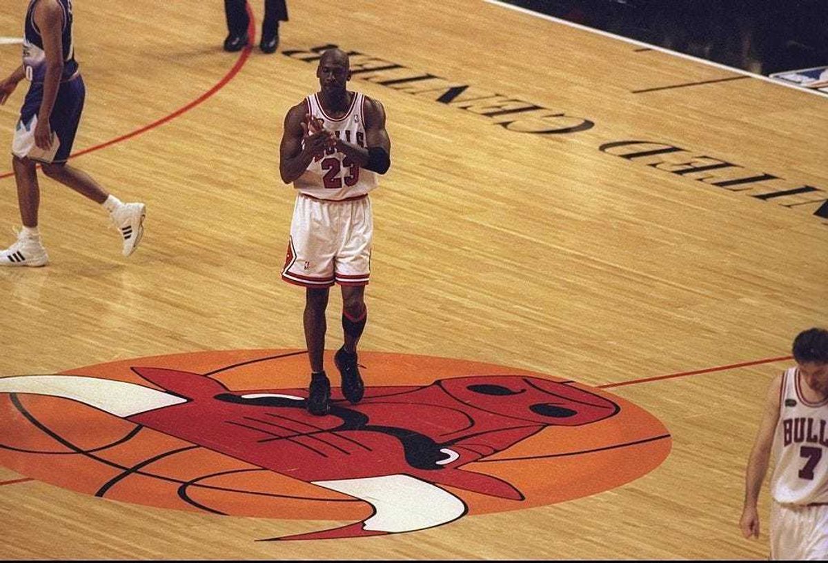Michael Jordan #23 of the Chicago Bulls walking to the bench duing a time out called during the NBA Finals game 3 against the Utah Jazz at the United Center in Chicago, Illinois. The Bulls defeated the Jazz 96-54.