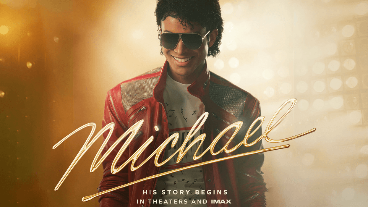 Michael movie poster: Smiling Michael Jackson in red jacket and sunglasses.