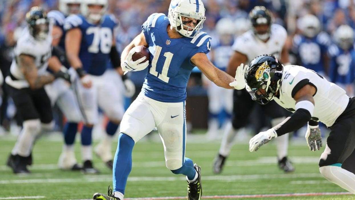 Michael Pittman stiff arm