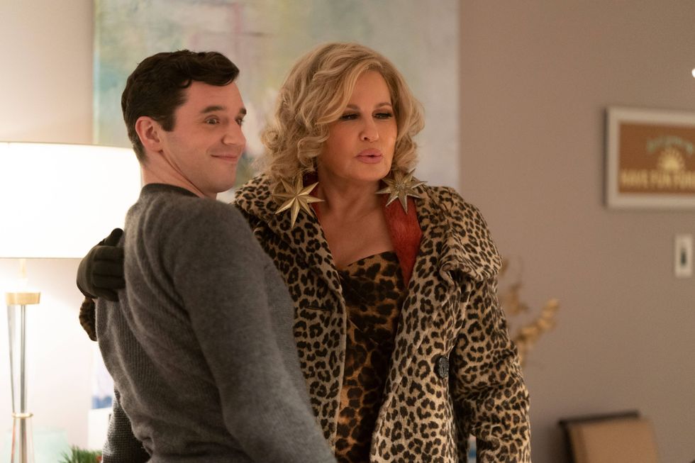 Michael Urie as Peter, Jennifer Coolidge as Aunt Sandy, in