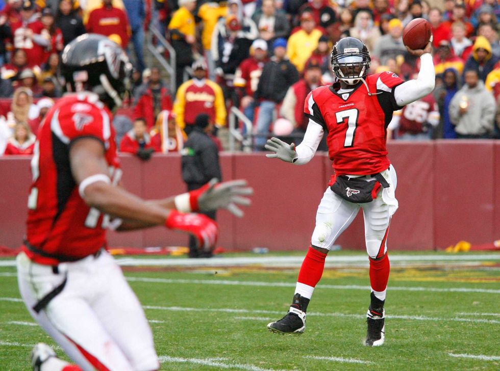 Michael Vick making a pass