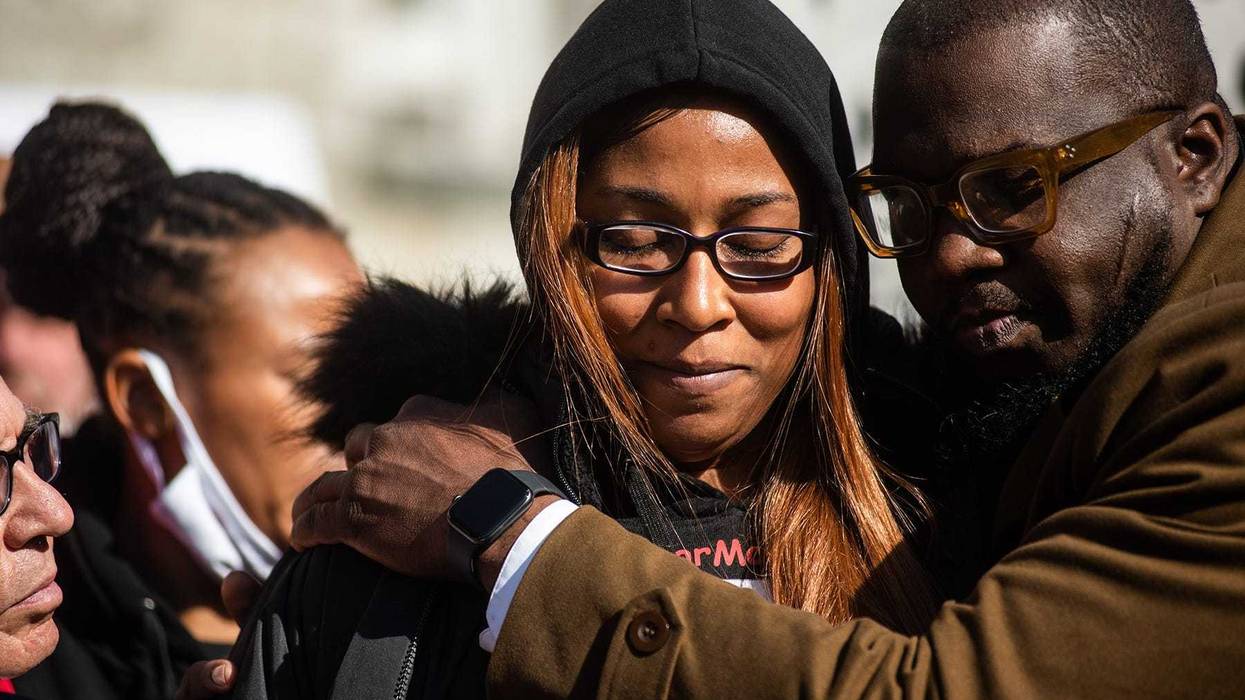 Michelle Surrency, the mother of Monica Goods, is comforted by Rev. Kevin McCall as she talks during a press conference outside the Ulster County Courthouse after the bail hearing for New York State Trooper Christopher Baldner in Kingston, NY on Thursday, November 4, 2021. Baldner's bail was denied.