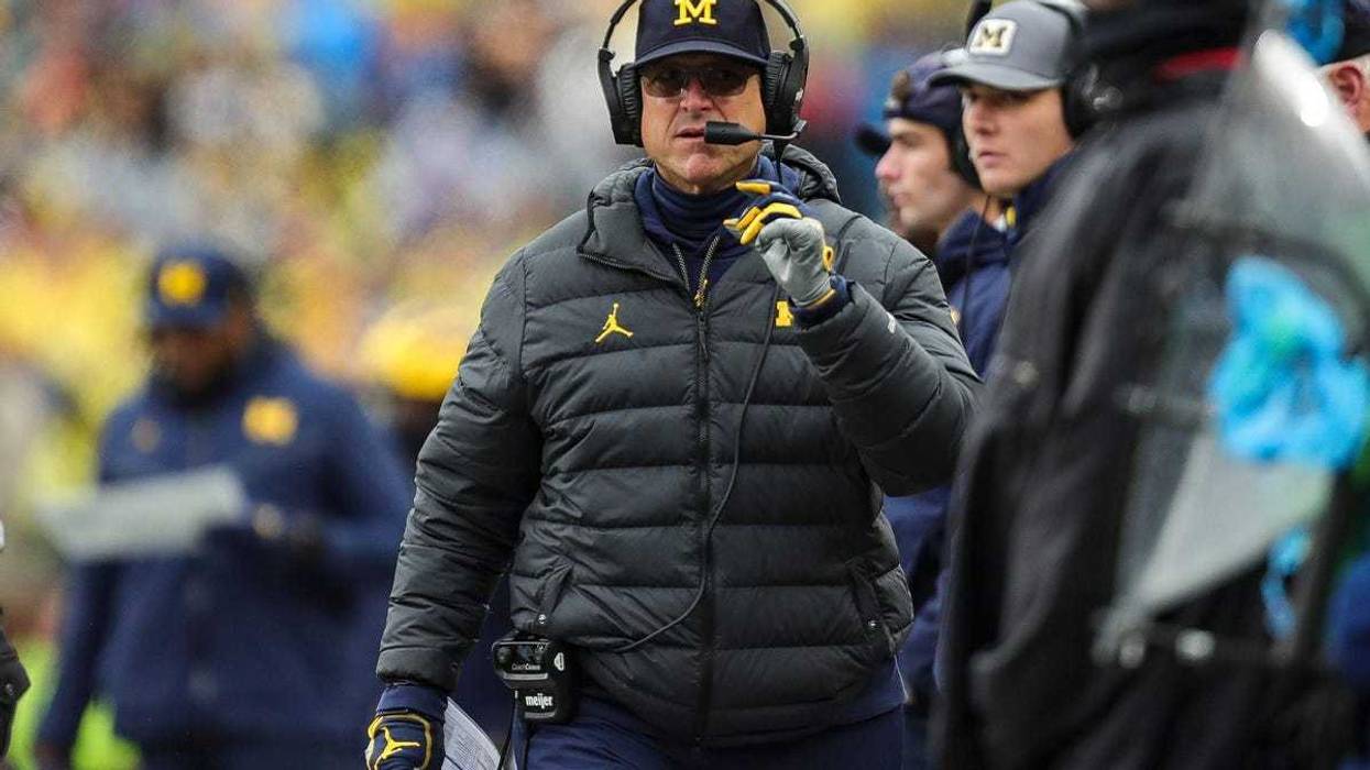 Michigan head coach Jim Harbaugh watches a play from the sidelines during an Oct. 14 game against Indiana.