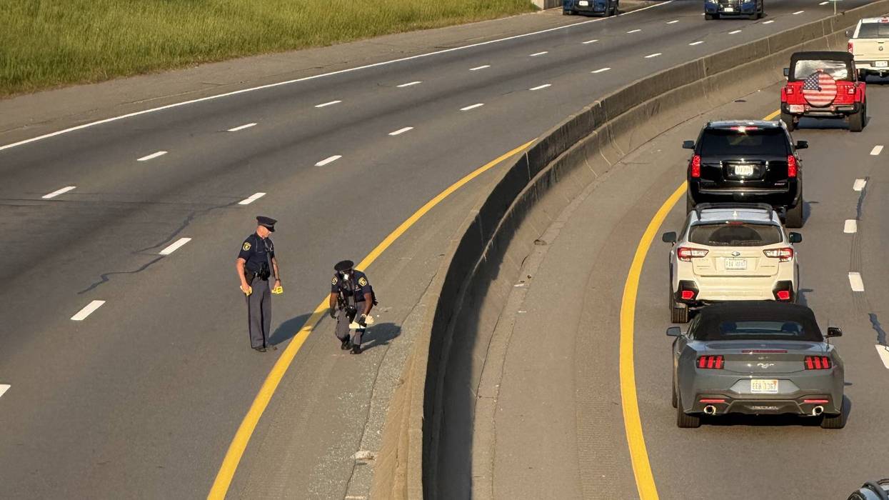Michigan State Police troopers canvass EB I-94 for evidence connected to a freeway shooting