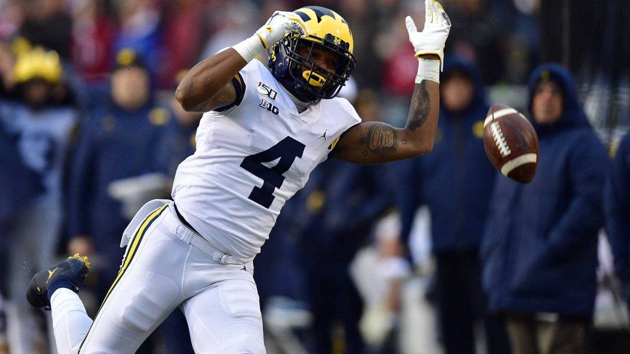 Michigan Wolverines wide receiver Nico Collins (4) looks at a ball he cannot reach for an incomplete pass during the first half of the game against the Indiana Hoosiers at Memorial Stadium .