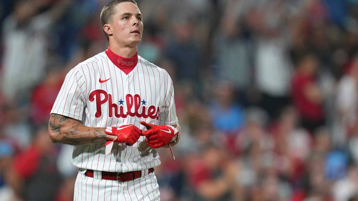 Mickey Moniak, then #16 of the Philadelphia Phillies, looks on against the Atlanta Braves at Citizens Bank Park on June 29, 2022, in Philadelphia, Pennsylvania.