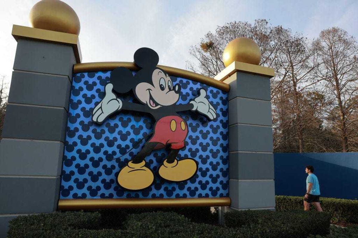Mickey Mouse welcomes visitors near an entrance to Walt Disney World on February 01, 2024, in Orlando, Florida. A federal judge has dismissed a lawsuit against Florida Gov. Ron DeSantis, which Walt Disney Co. said it will be appealing its loss in a lawsuit. The case revolves around the Governor taking over Disney's special governing district after Disney opposed Florida legislation that critics have dubbed “Don’t Say Gay.” (Photo by Joe Raedle/Getty Images)
