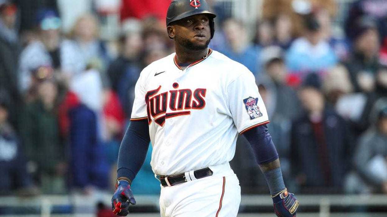 Miguel Sano #22 of the Minnesota Twins reacts to striking out against the Seattle Mariners in the ninth inning on Opening Day at Target Field on April 8, 2022 in Minneapolis, Minnesota.