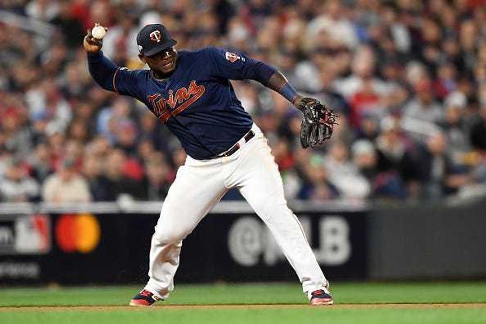 Miguel Sano #22 of the Minnesota Twins turns a double play against the New York Yankees to end the seventh inning in game three of the American League Division Series at Target Field on October 07, 2019 in Minneapolis, Minnesota.