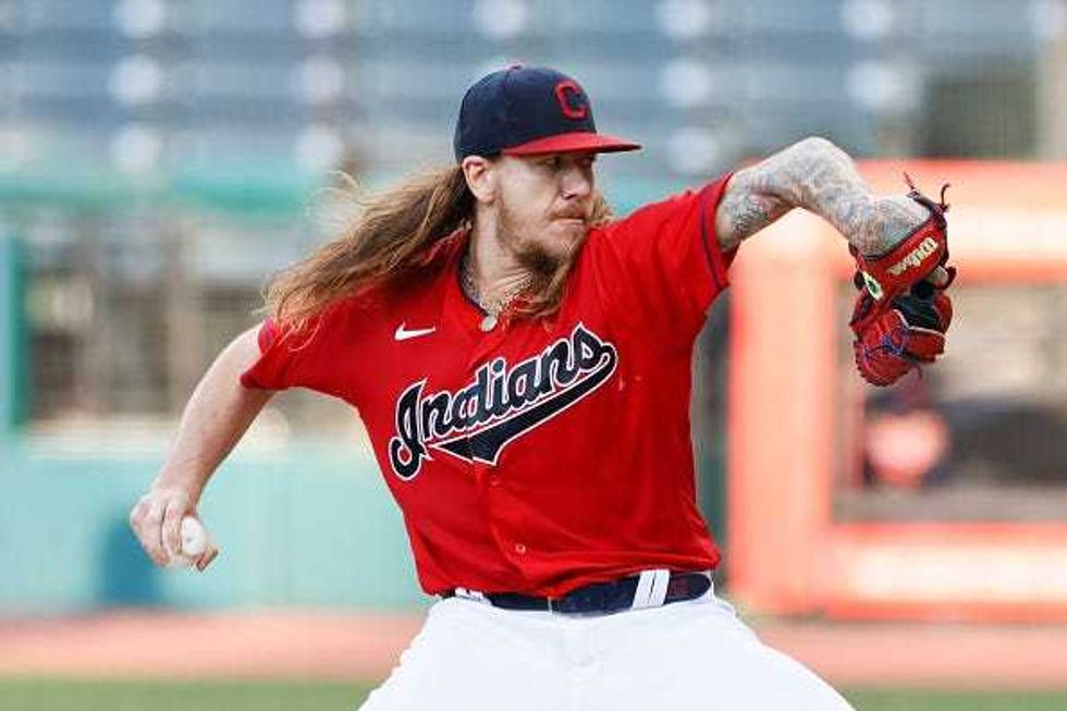 Mike Clevinger pitches for the Indians.