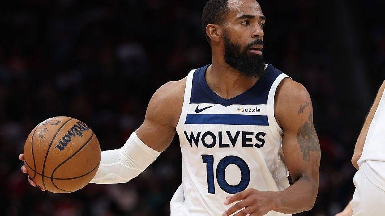 Mike Conley #10 of the Minnesota Timberwolves in action during the game against the Houston Rockets at Toyota Center on January 16, 2026 in Houston, Texas.