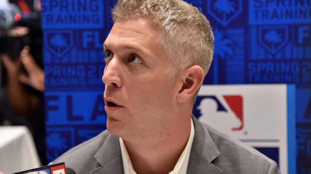 Mike Elias responds to reporters questions at media day