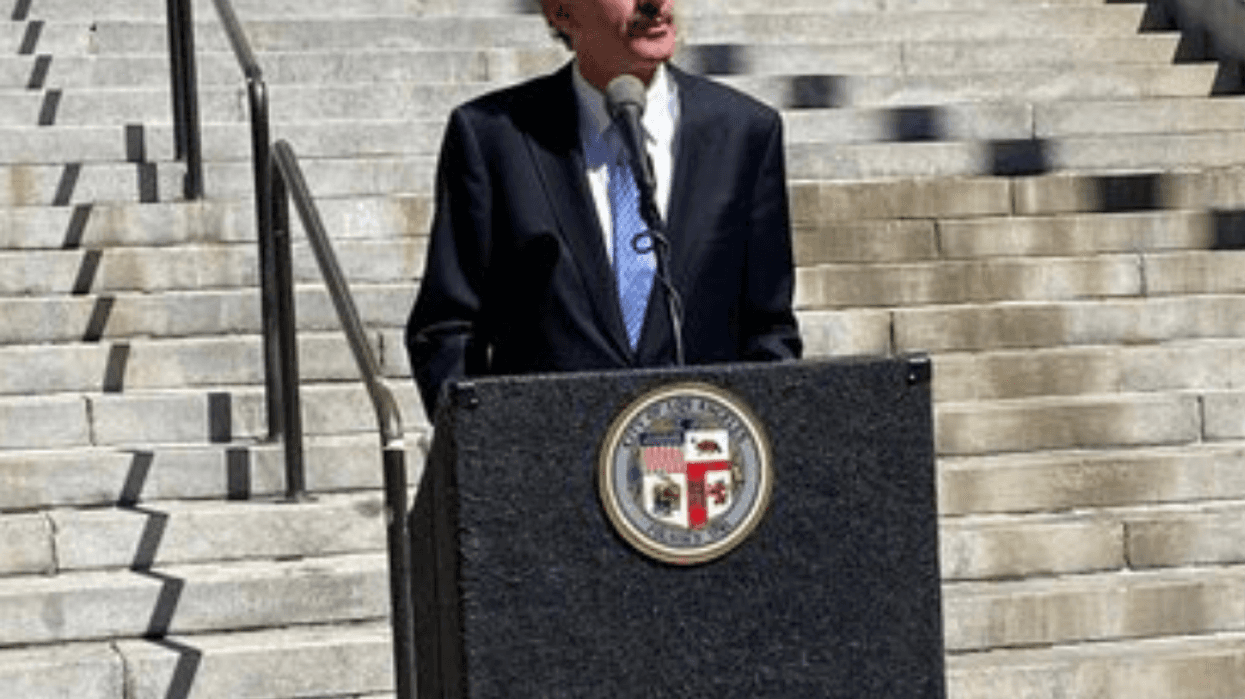 Mike Feuer announcing a lawsuit filed against Monsanto and two other companies for allegedly polluting the City of Los Angeles' waterways with PCBs in a news conference outside City Hall.