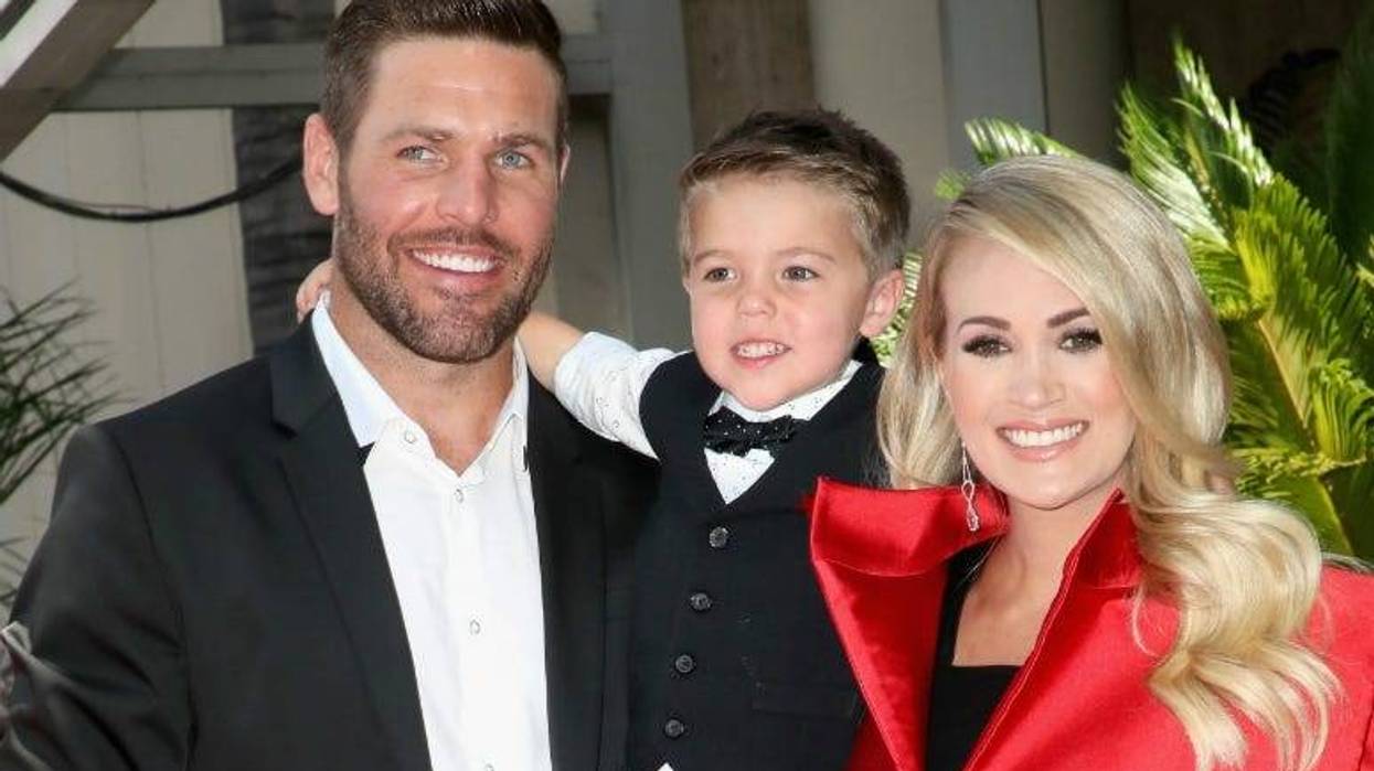 Mike Fisher and Isaiah Michael Fisher attend as Carrie Underwood is honored with a star on The Hollywood Walk of Fame