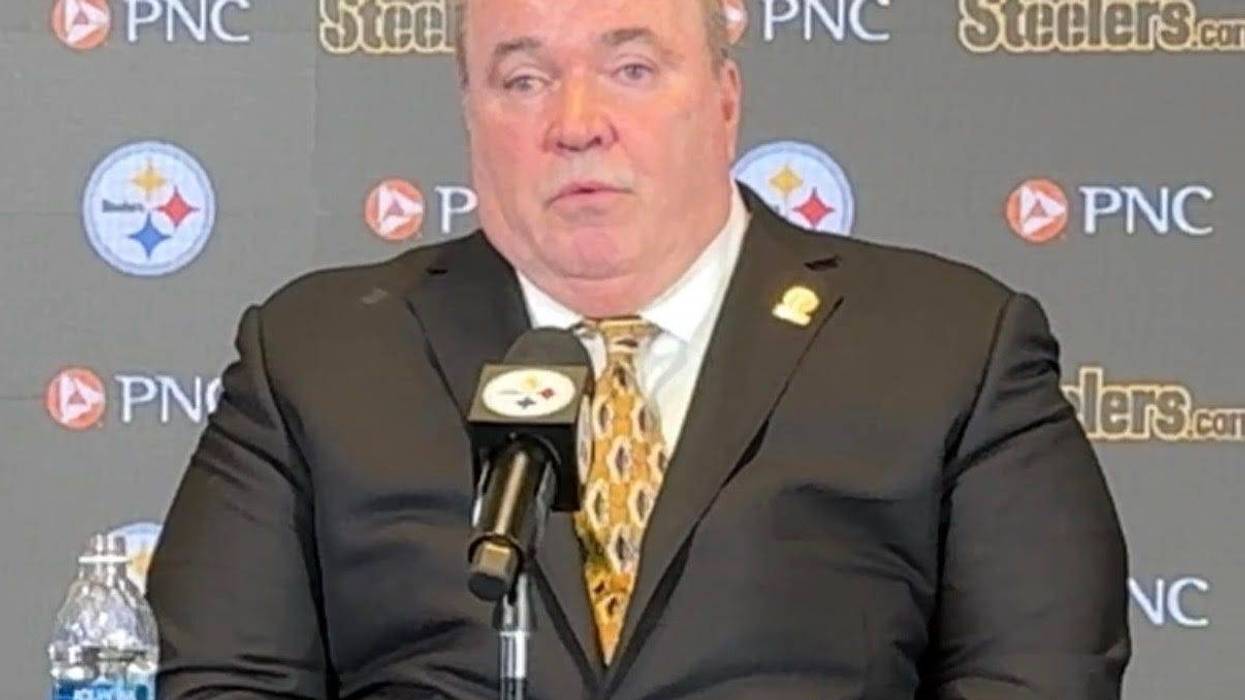 Mike McCarthy at podium